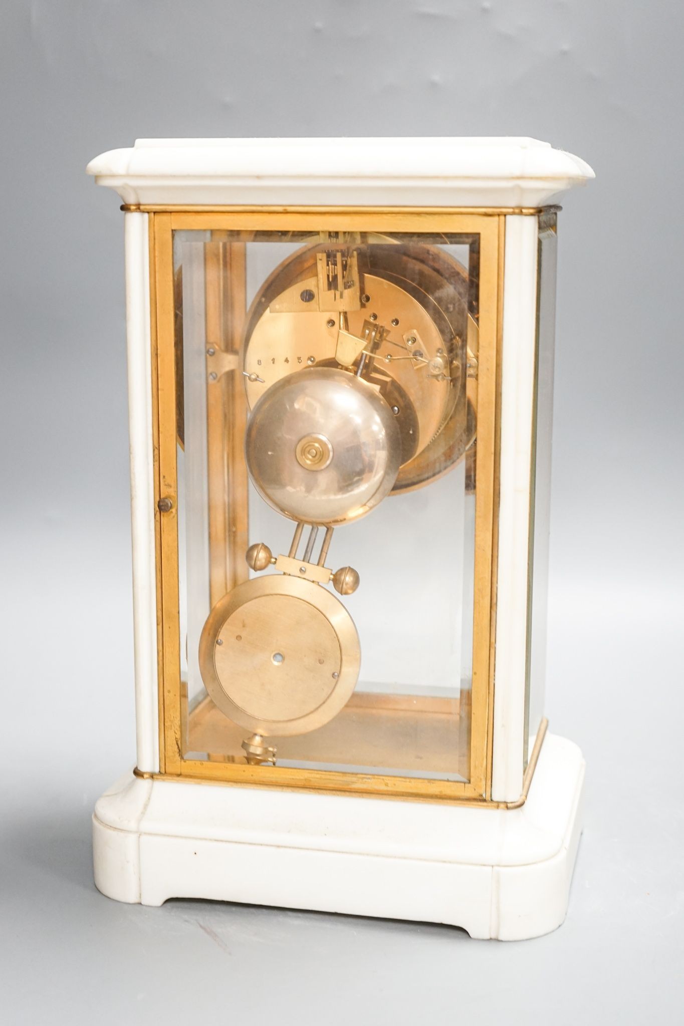 An unusual French white marble and brass cased four glass mantel clock, late 19th century, bi-metallic pendulum, no key. 32cm